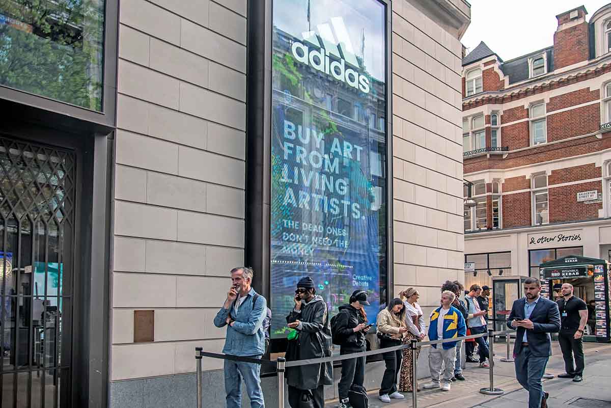 Adidas London. People queueing to get in. Photo by Street Art Atlas